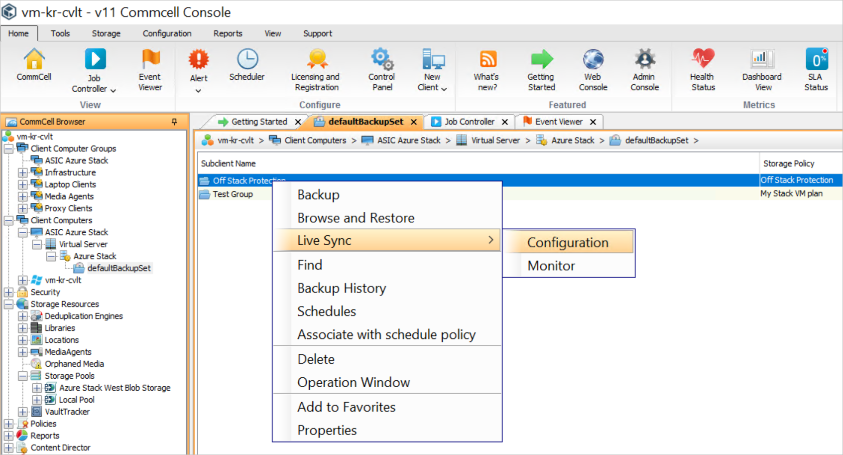 The Commcell console shows the tabbed page "vm-kr-cvlt > Client Computers > ASIC Azure Stack > Virtual Server > Azure Stack > defaultBackupSet". A context menu for the Off Stack Protection on the page has a Live Sync > Configuration option.