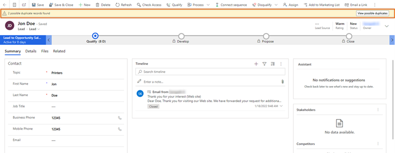 Screenshot of opening a lead and selecting view possible duplicates.