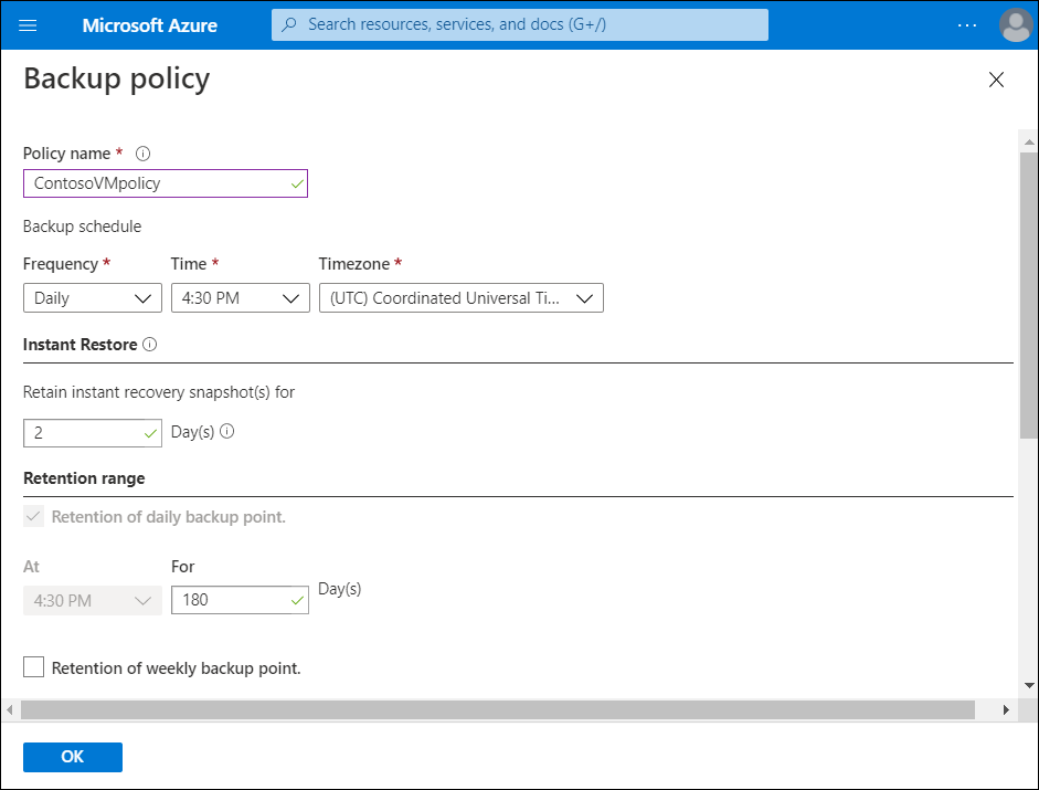 A screenshot of the Backup policy blade. The administrator has named the policy ContosoVMpolicy. 