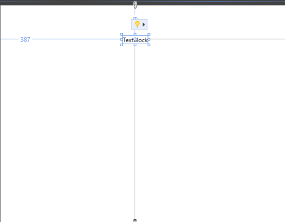 Screenshot of the TextBlock control on the design surface. Guidelines are shown for positioning and resizing the control.