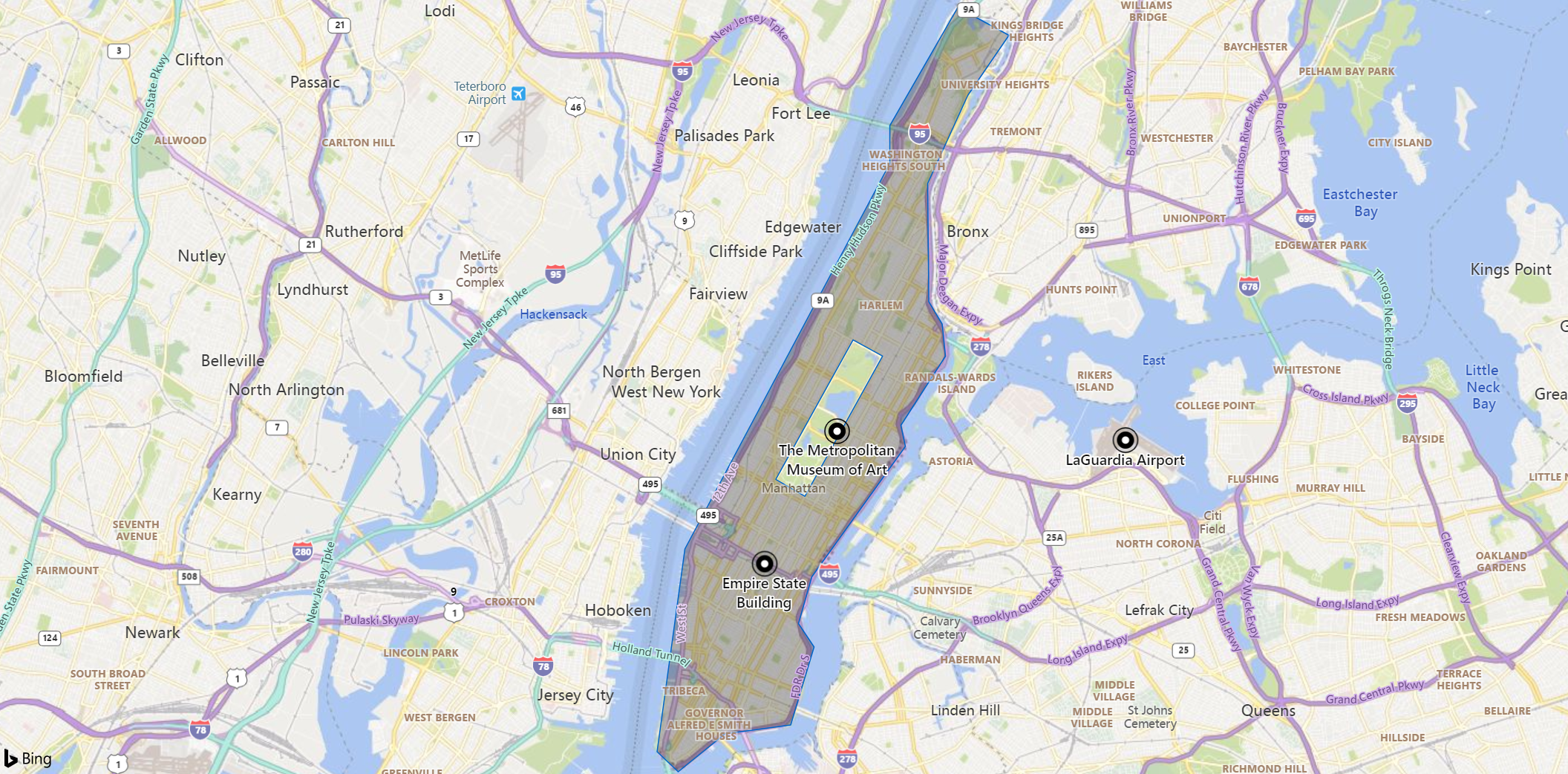 Captura de pantalla de un mapa del área de Manhattan, con marcadores para un punto de referencia, un museo y un aeropuerto. La isla aparece atenuada excepto el Parque Central.