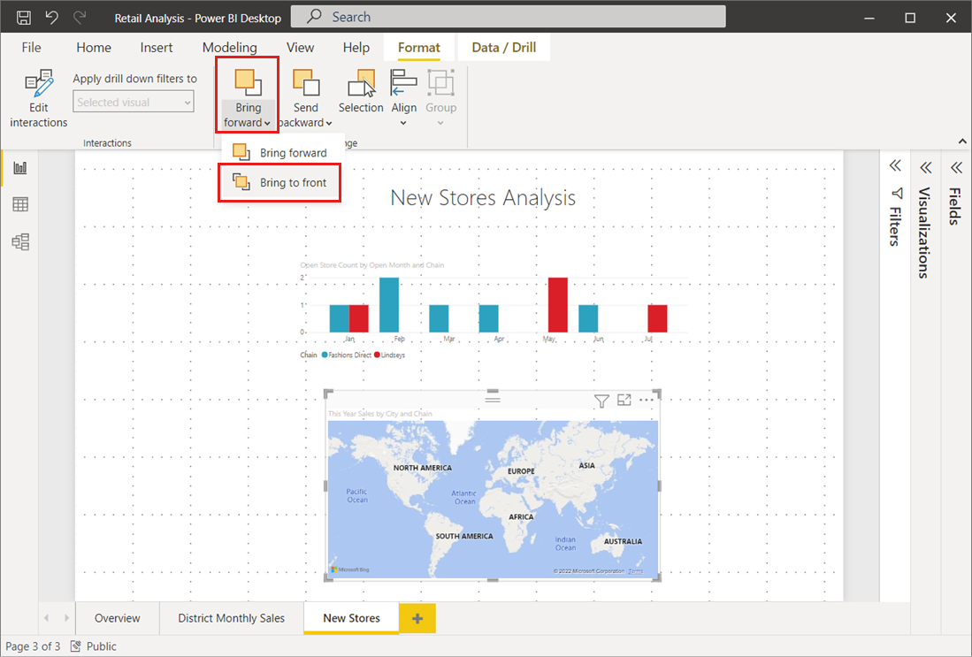 Captura de pantalla del lienzo de Power BI Desktop en el que se muestra el menú Traer adelante con la opción Traer al frente seleccionada.