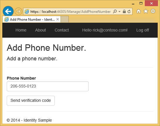 Capture d’écran montrant la page Ajouter un numéro de téléphone de l’application A SP dot NET. Un exemple de numéro de téléphone est rempli avec un bouton Envoyer un code de vérification en dessous.