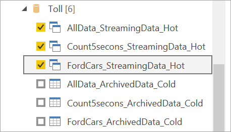 Capture d’écran montrant les tables de sortie chaudes sélectionnées pour les flux de données en streaming dans Power BI Desktop.