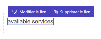 Un lien à l’intérieur du studio de conception. Les boutons avec les options Modifier le lien et Supprimer le lien s’affichent directement au-dessus du lien sélectionné.