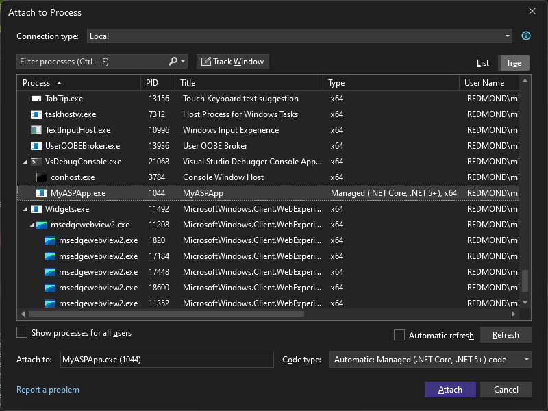 Capture d’écran de la boîte de dialogue Attacher au processus, avec la cible de connexion définie sur le nom de la machine locale.