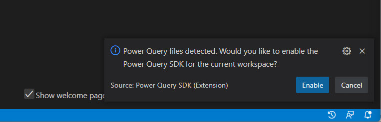 Popup nell'interfaccia di Visual Studio Code che suggerisce all'utente un aggiornamento all'area di lavoro di Power Query SDK.