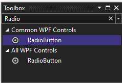 Screenshot della finestra Casella degli Strumenti con il controllo RadioButton selezionato nell'elenco dei controlli WPF comuni.