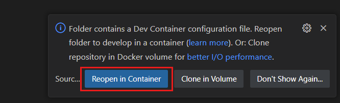 Zrzut ekranu przedstawiający wyskakujące powiadomienie w celu ponownego otwarcia bieżącego folderu w kontekście kontenera deweloperskiego.