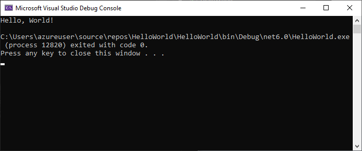 Zrzut ekranu przedstawiający okno Konsola debugowania z danymi wyjściowymi Hello, World! i naciśnij dowolny, aby zamknąć to okno.