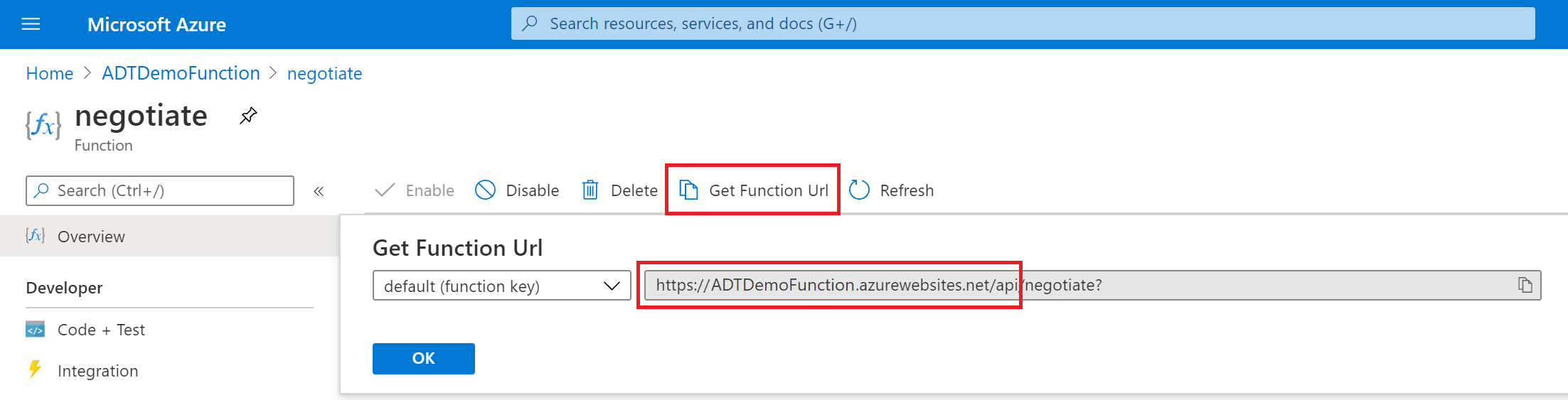 Captura de tela do portal do Azure mostrando a função “negotiate” com o botão “Obter URL da função” e a URL da função realçada.