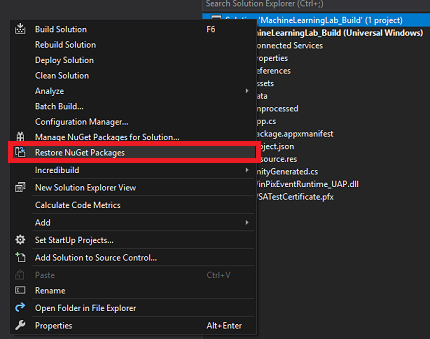 Captura de tela da janela do Visual Studio, que mostra o item de menu Restaurar Nu Get Packages realçado.