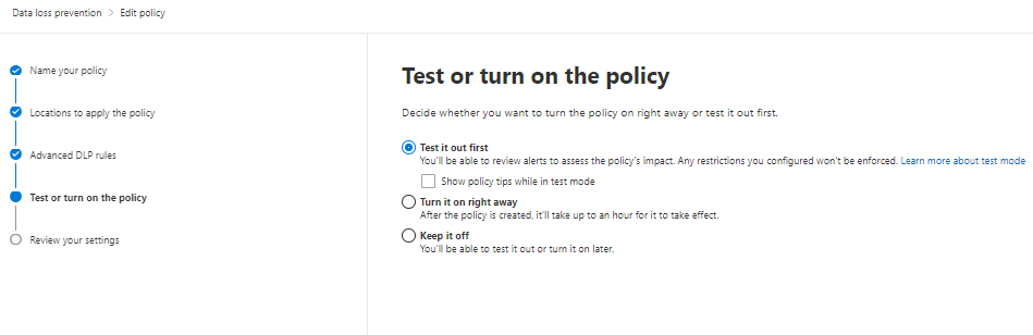 Captura de ecrã da janela intitulada Testar ou ativar a política. O status intitulado Test it out first é destacado no status da política.