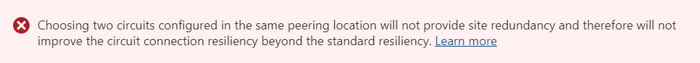 Skärmbild av varningen i Azure Portal när du väljer två ExpressRoute-kretsar på samma peeringplats.